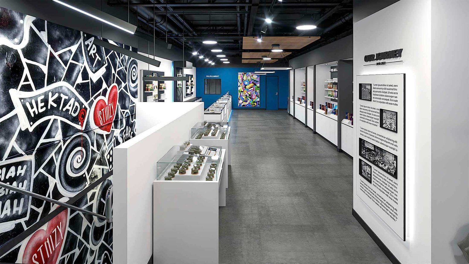 Modern dispensary interior with graffiti accent wall, white display cases, and blue back wall
