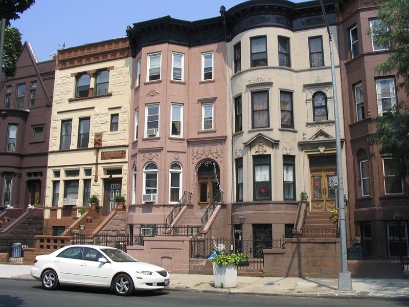 Bedford-Stuyvesant Brooklyn brownstone row houses on a tree-lined block