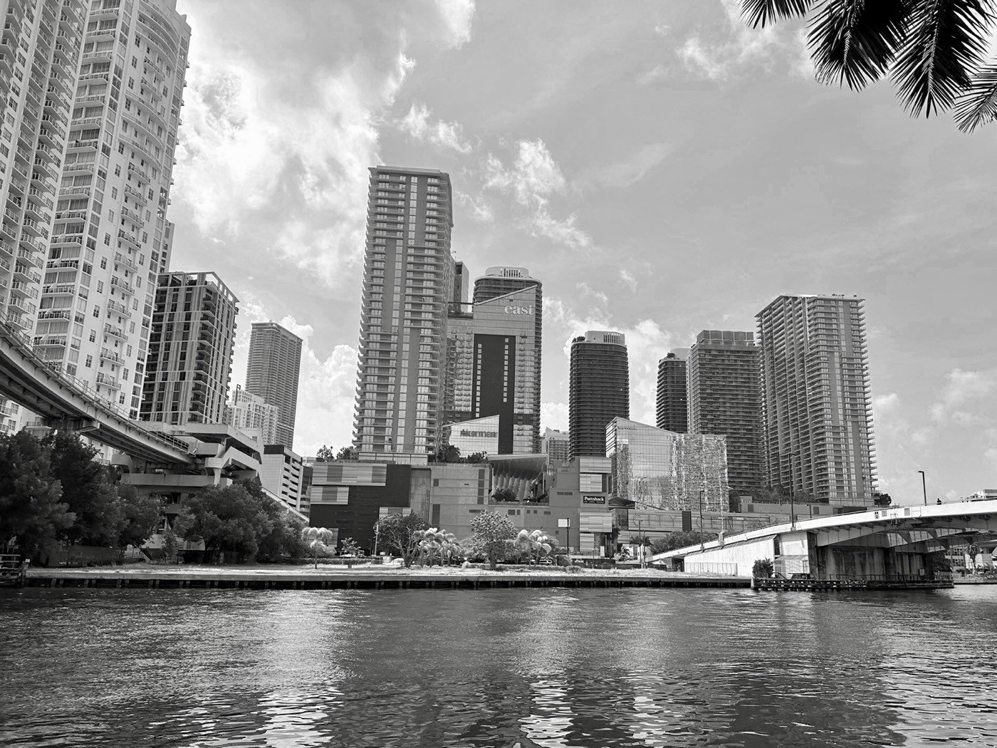 Brickell financial district skyline in Miami Florida with high-rise condominiums on the Miami River