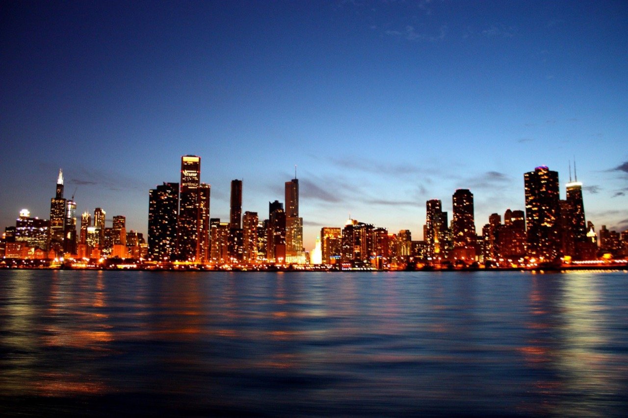 Chicago skyline at dusk seen from Lake Michigan with the Loop towers and lakefront