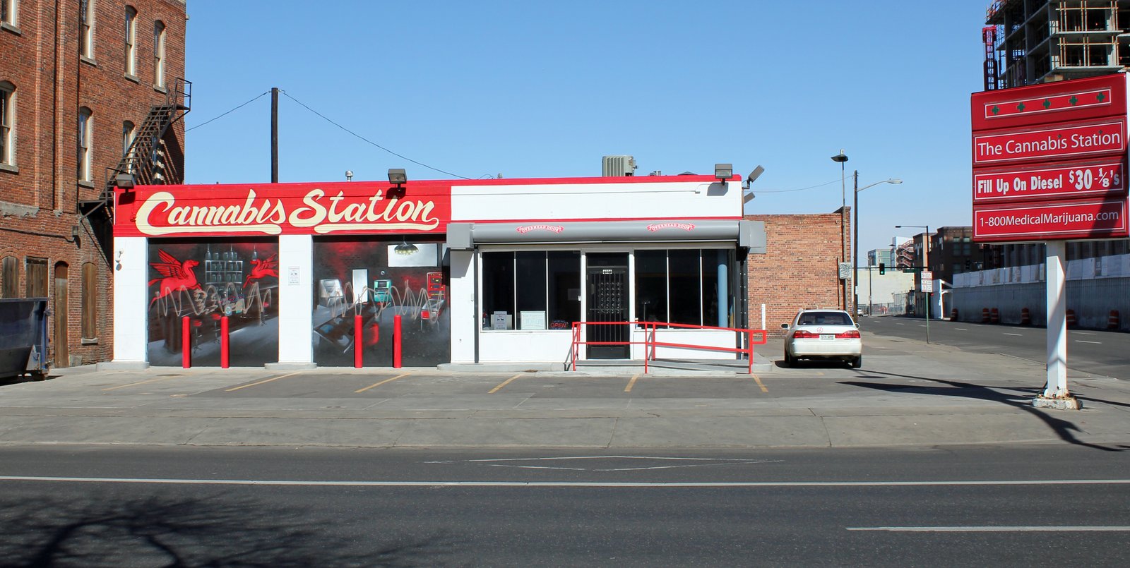 Cannabis dispensary exterior in Denver Colorado showing storefront retail signage