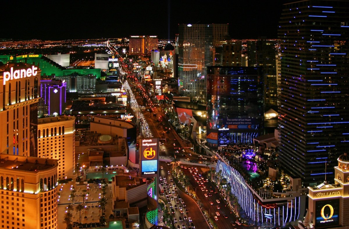 The Las Vegas Strip at night looking north toward the corridor where Planet 13's 112,000-square-foot SuperStore sits two miles west of the Bellagio.