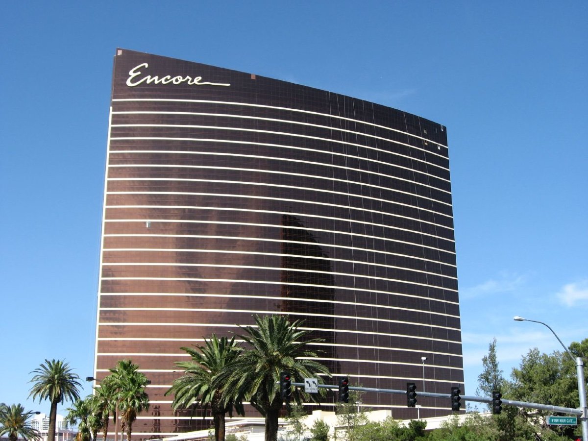 The Wynn and Encore towers on the north Las Vegas Strip, the hotel cluster six minutes on foot from Thrive Cannabis Marketplace's Strip-adjacent storefront on Sammy Davis Jr Drive.