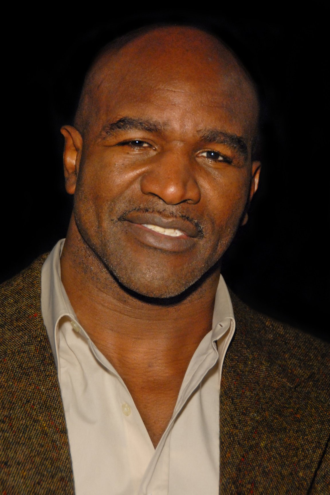 Evander Holyfield in Hollywood, December 2011, the boxer whose 1997 bitten ear became the shape of the Holyfield Ear Bites cannabis gummies launched in June 2021