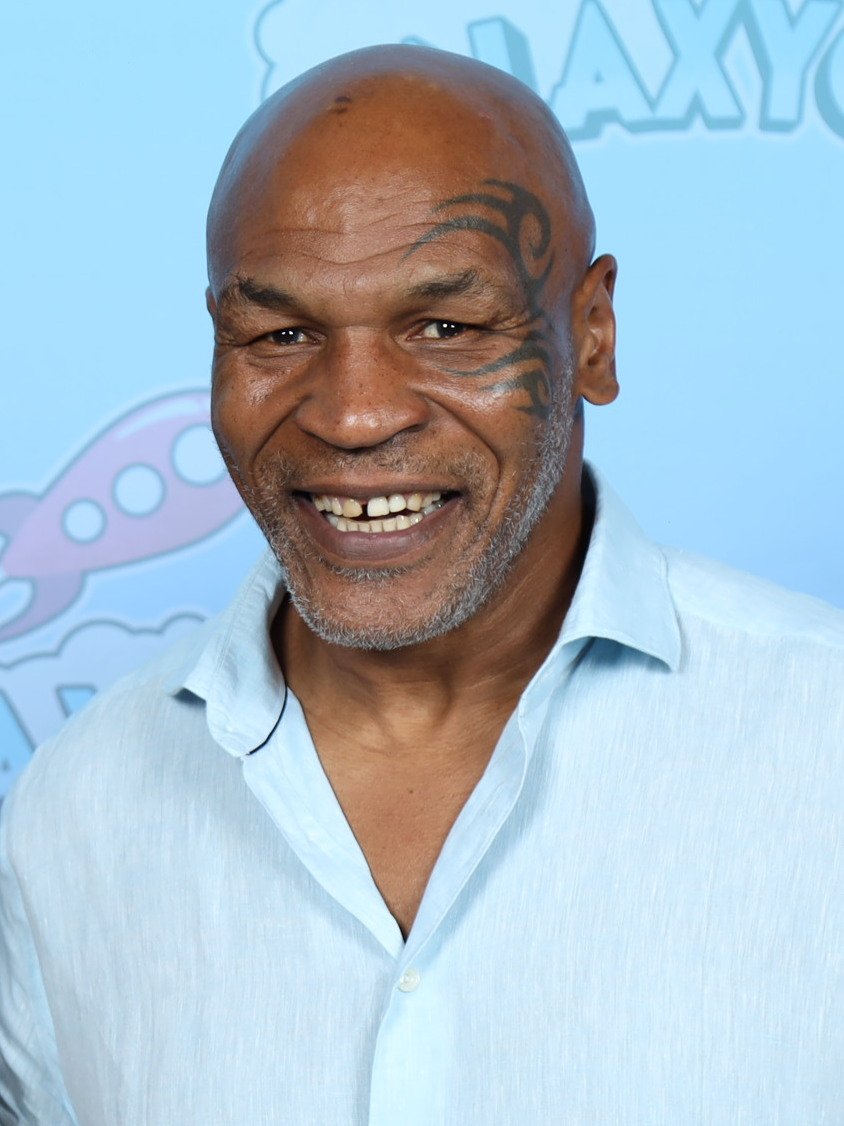 Mike Tyson photographed at GalaxyCon Austin 2023, the public-facing presence still anchoring the Tyson 2.0 and Carma HoldCo expansion through 2026
