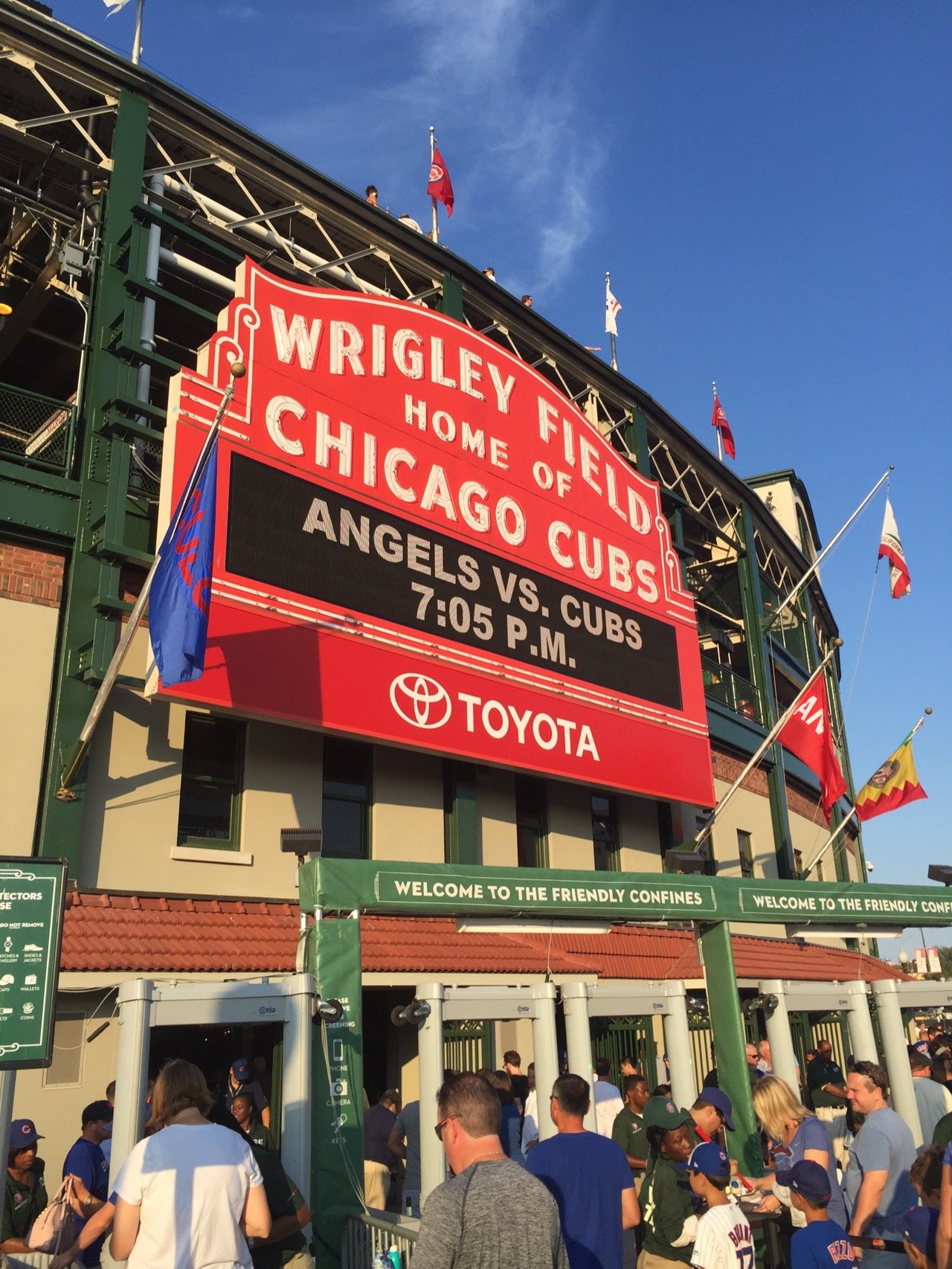 Wrigley Field red art deco marquee with Cubs game time, Sunnyside Wrigleyville dispensary is steps from this entrance