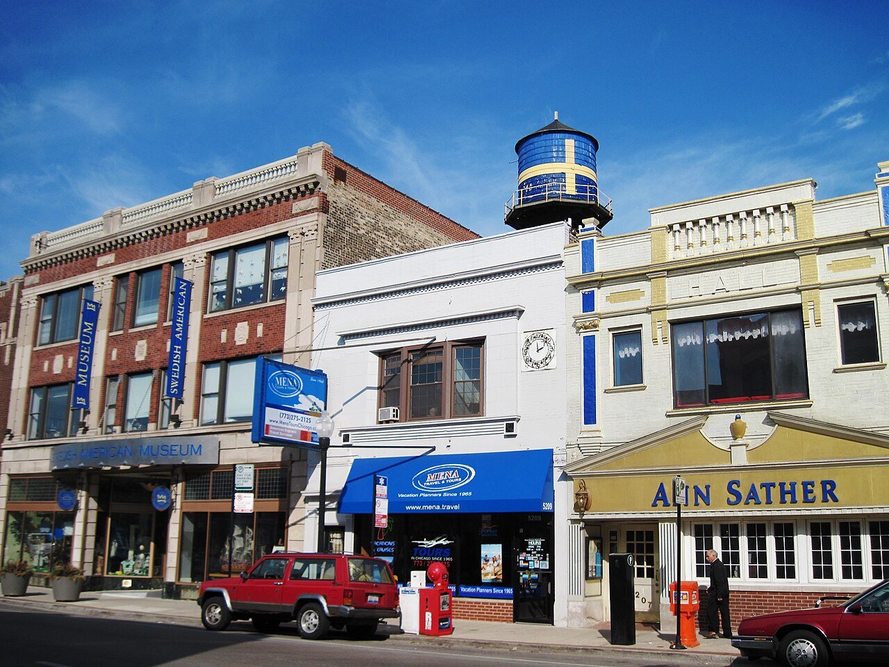Andersonville Clark Street with the Swedish American Museum, Ann Sather restaurant, and the iconic Swedish flag water tower, Dispensary 33 Chicago