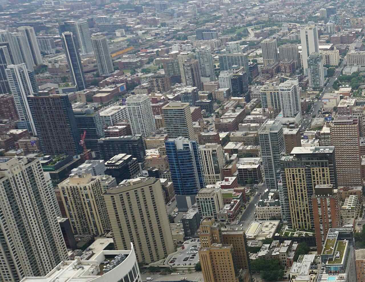 Aerial view of the dense River North and Near North Side high-rise district in Chicago, the downtown grid of residential towers and hotels where Ascend River North dispensary operates