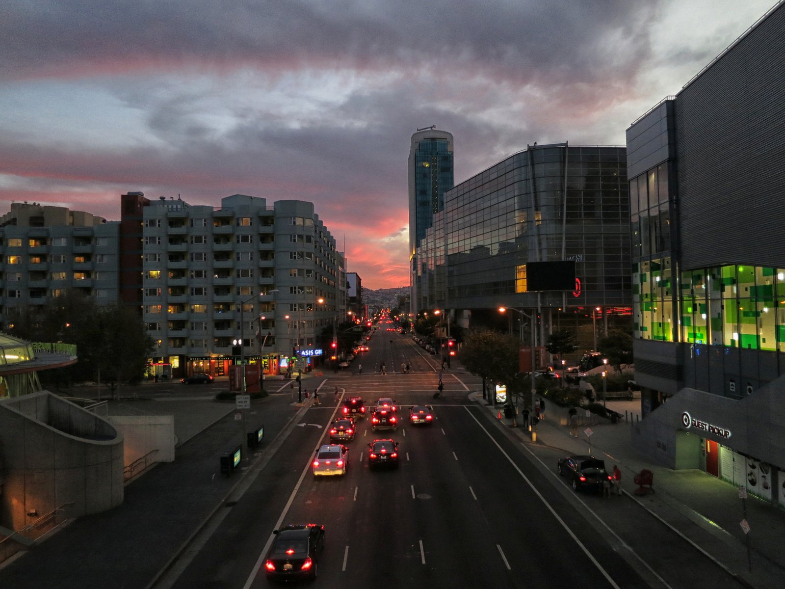 Howard Street in the SoMa neighborhood of San Francisco at sunset with car traffic and Yerba Buena buildings near The Apothecarium SoMa