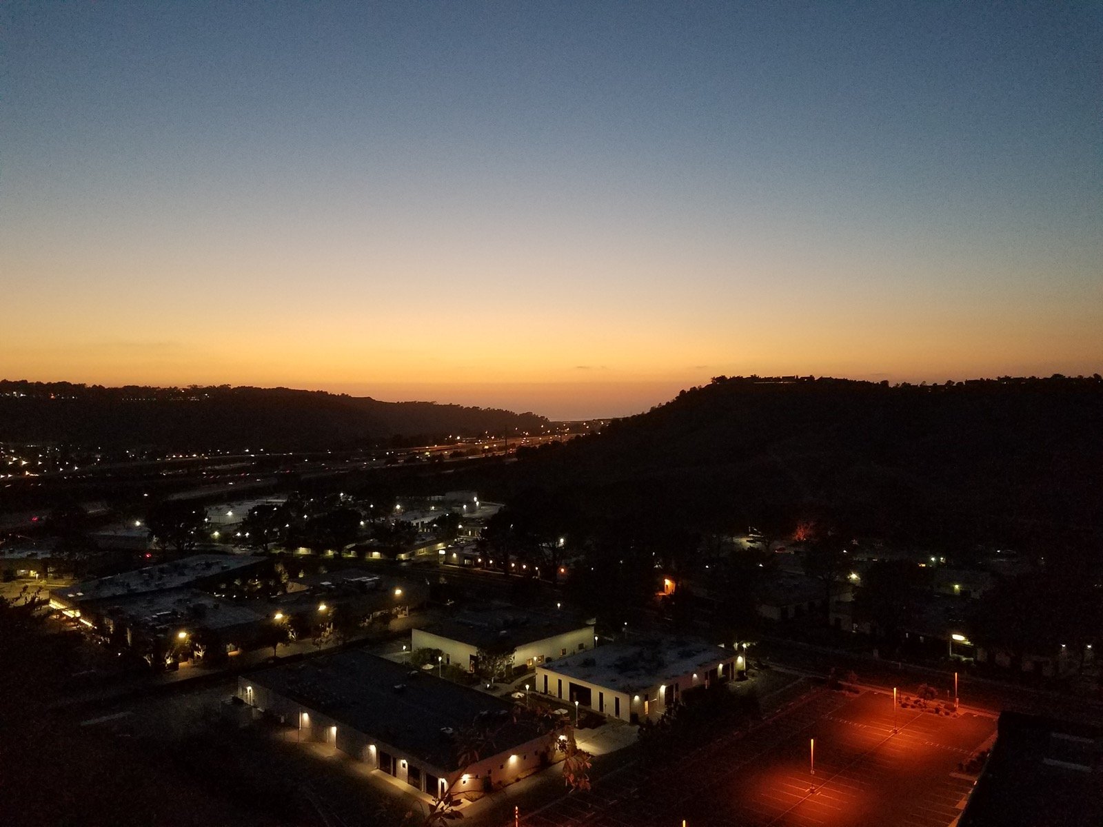 Sorrento Valley San Diego at dusk showing the low-rise tech park district where Torrey Holistics operates on Roselle Street