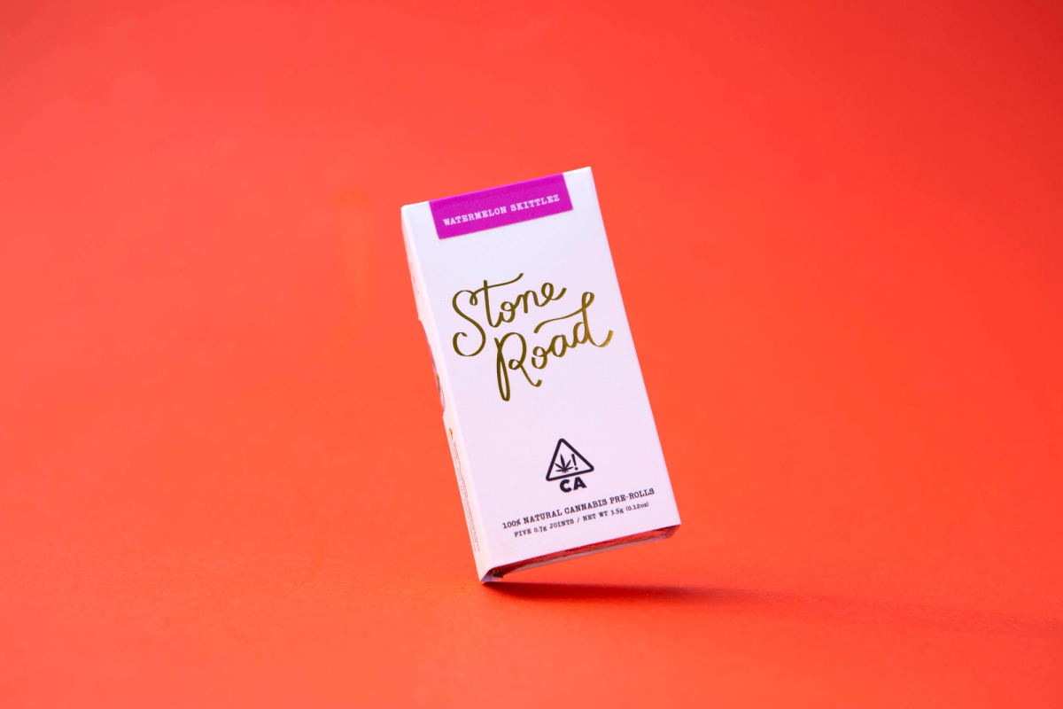 Stone Road eighth pack of organic cannabis pre-rolls in pink and white packaging