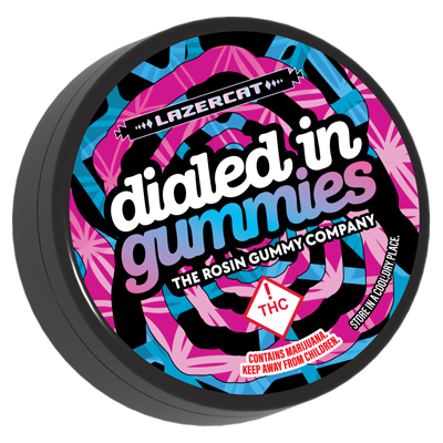 Dialed In Gummies Lazercat collab tin with pink and blue psychedelic label artwork and Colorado THC warning symbol